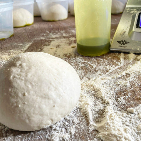 Close-up of smooth, well-fermented 24-hour pizza dough, ready to stretch and bake