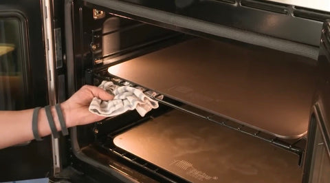 Baking Steel Plus on top and bottom rack inside oven