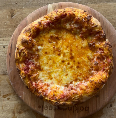 70% hydration cheese pizza made in a home oven on a Baking Steel
