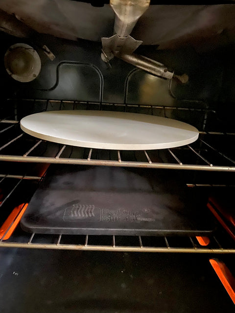 Pizza stone in an oven