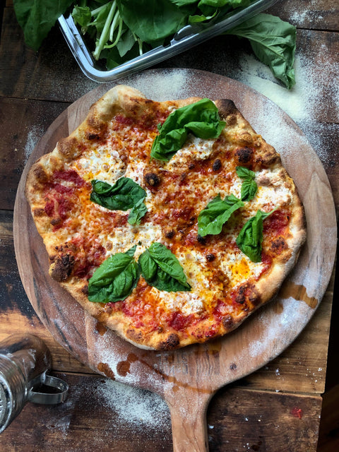 Same-day pizza dough baked on a Baking Steel — margherita with fresh basil, ready in 8 hours